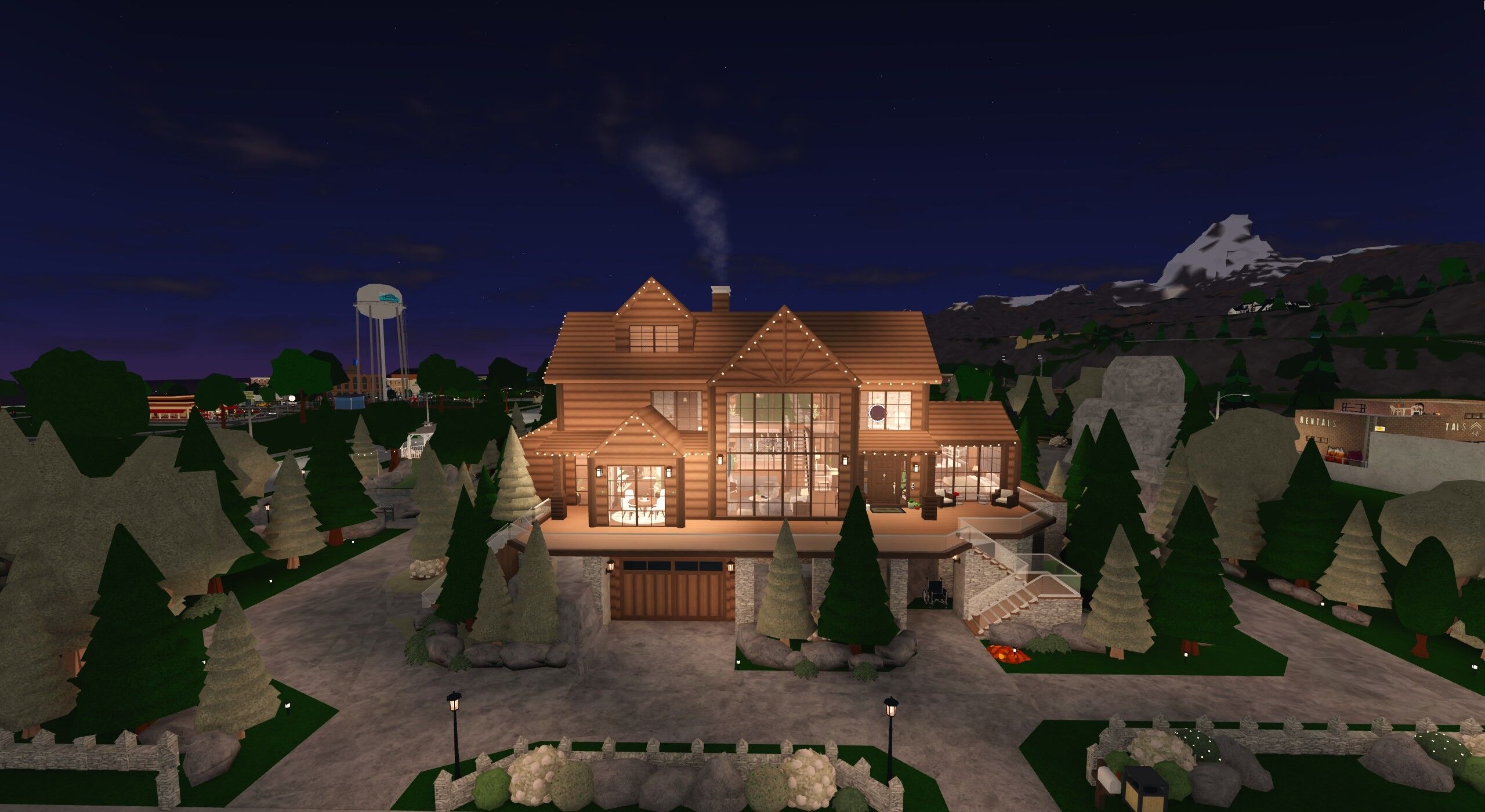 Timberline Lodge, a wooden Bloxburg cabin at night surrounded by pine trees, with smoke rising from the chimney